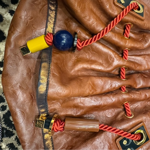 Louis Vuitton Snakeskin-Trimmed Monogram Epices Kalahari GM - Picture 10 of 14